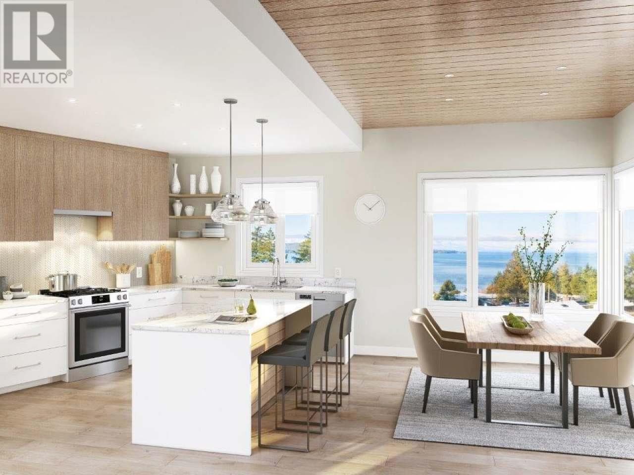 102-7020 TOFINO STREET in 