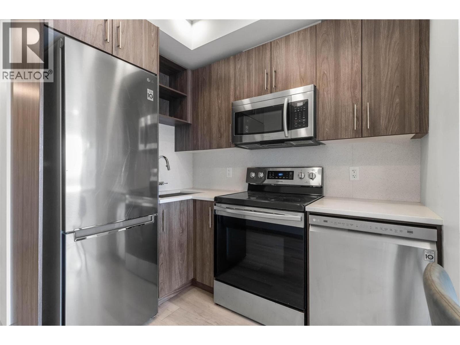 345 DOUGALL ROAD NORTH UNIT 210, Interior REALTORS® — photo 4