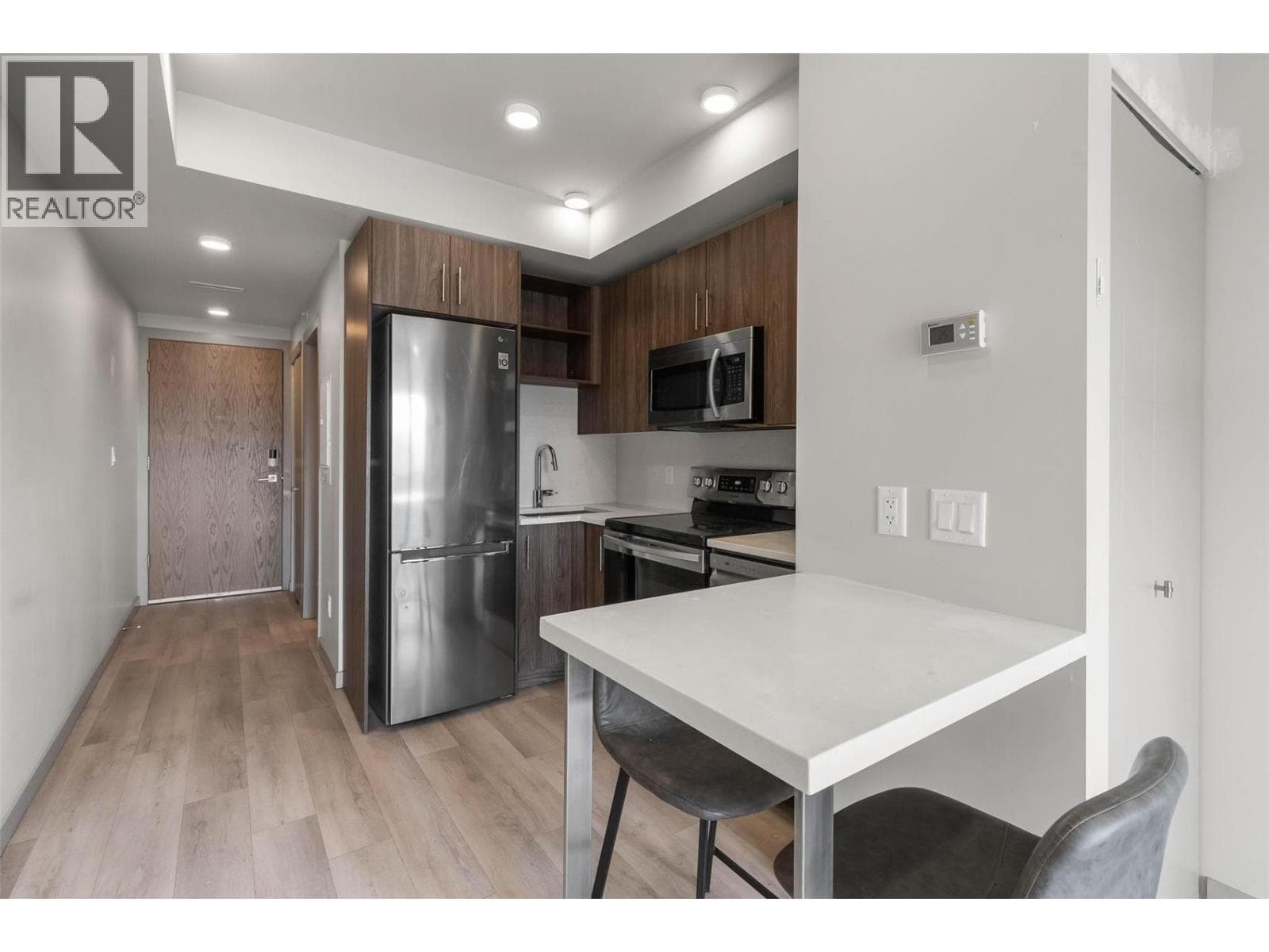 345 DOUGALL ROAD NORTH UNIT 210, Interior REALTORS® — photo 5