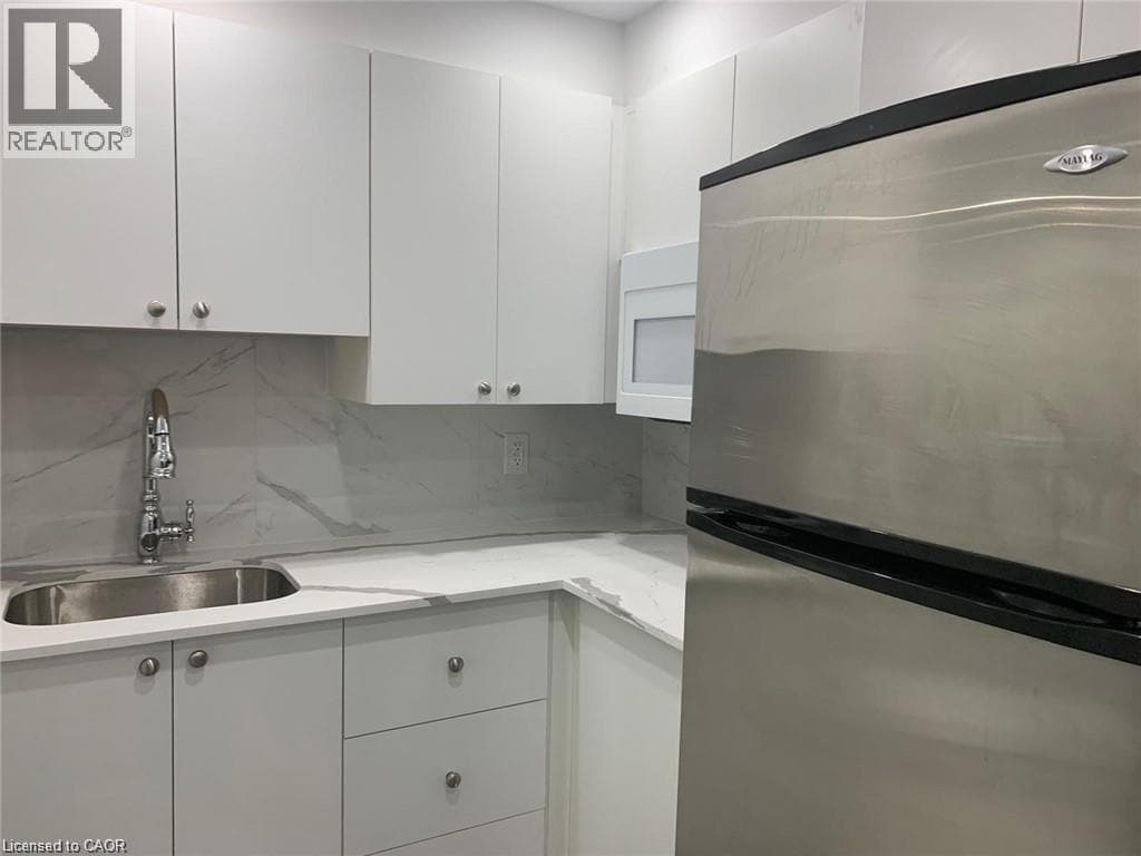1005 FARMSTEAD Drive Unit# Basement, Cornerstone — photo 4