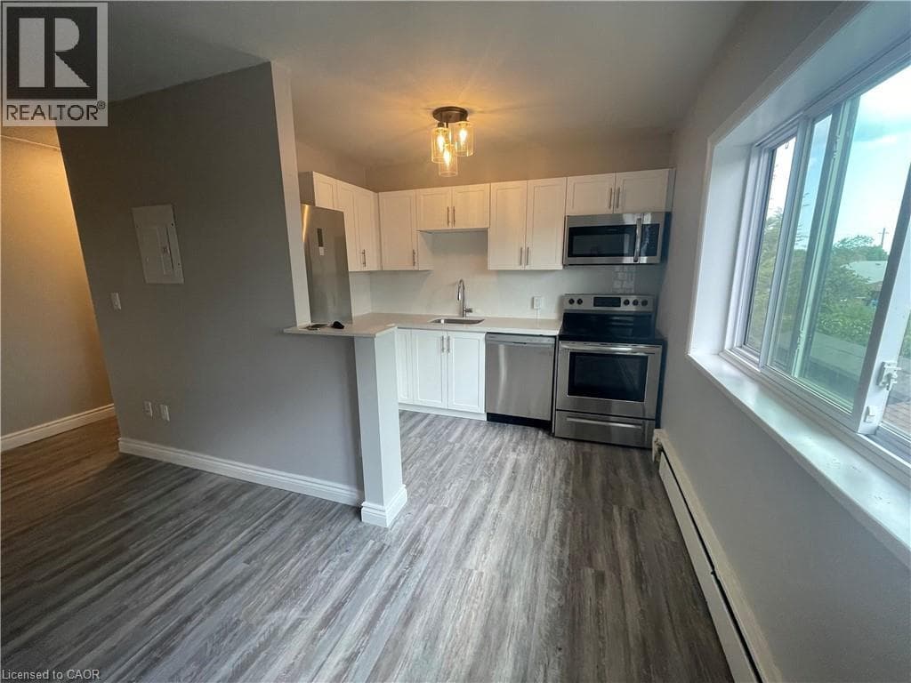 385 MELVIN Avenue Unit# 102 — photo 2