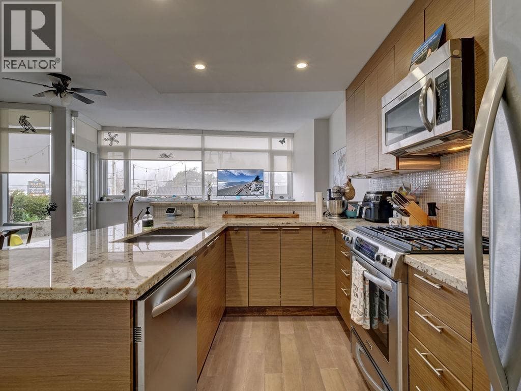 210 5725 TEREDO STREET — photo 3