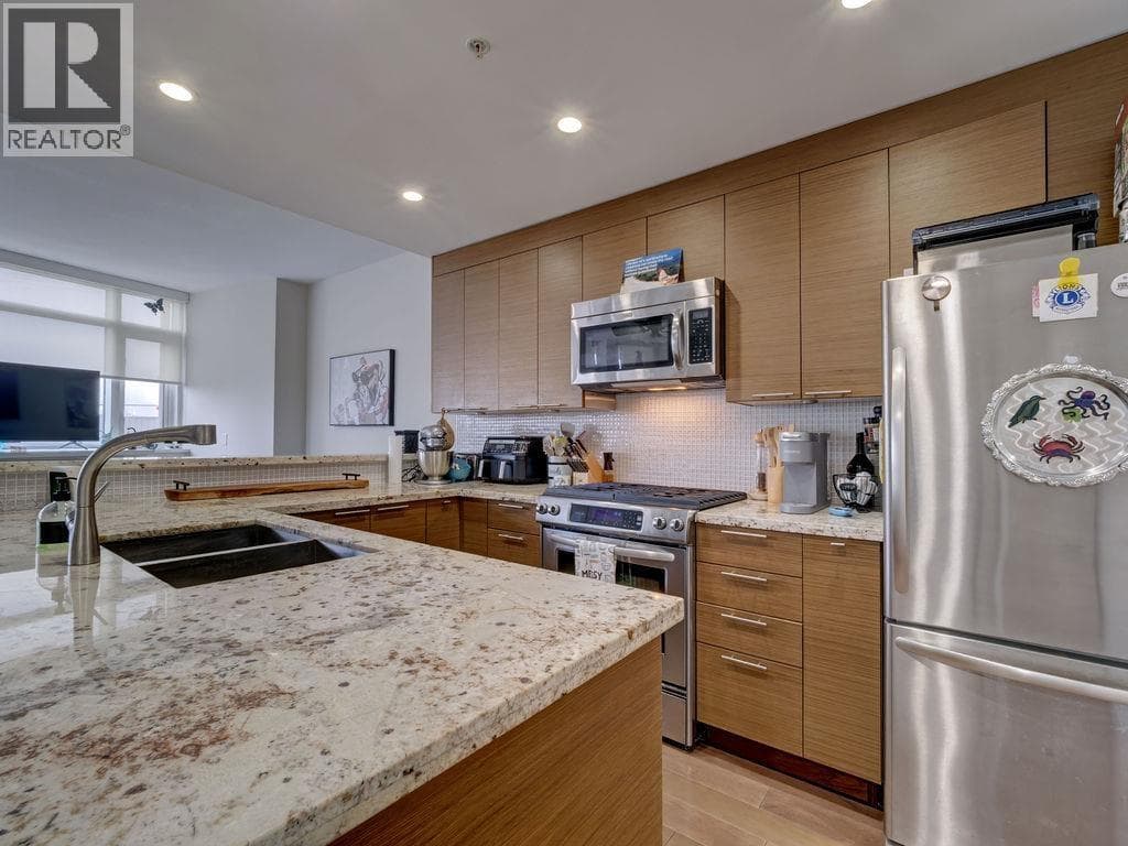 210 5725 TEREDO STREET — photo 5