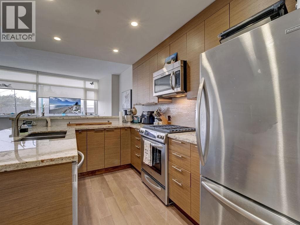 210 5725 TEREDO STREET — photo 4