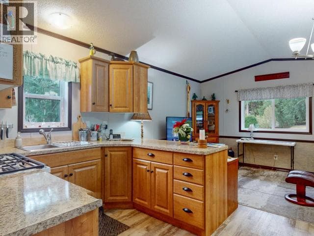 125-8430 SPRINGBROOK ROAD — photo 3