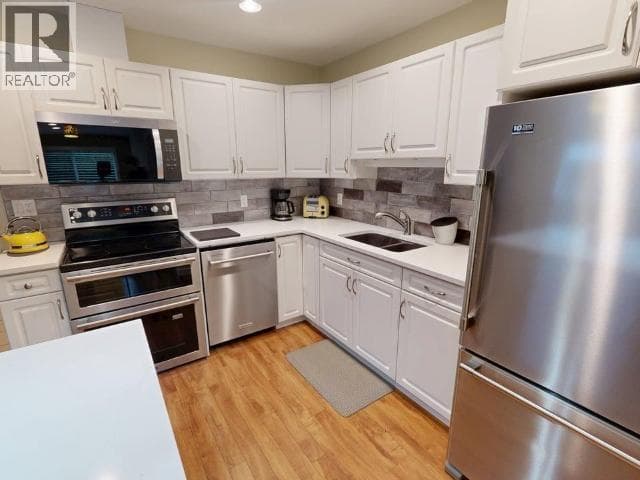 11-4415 MANSON AVE in 