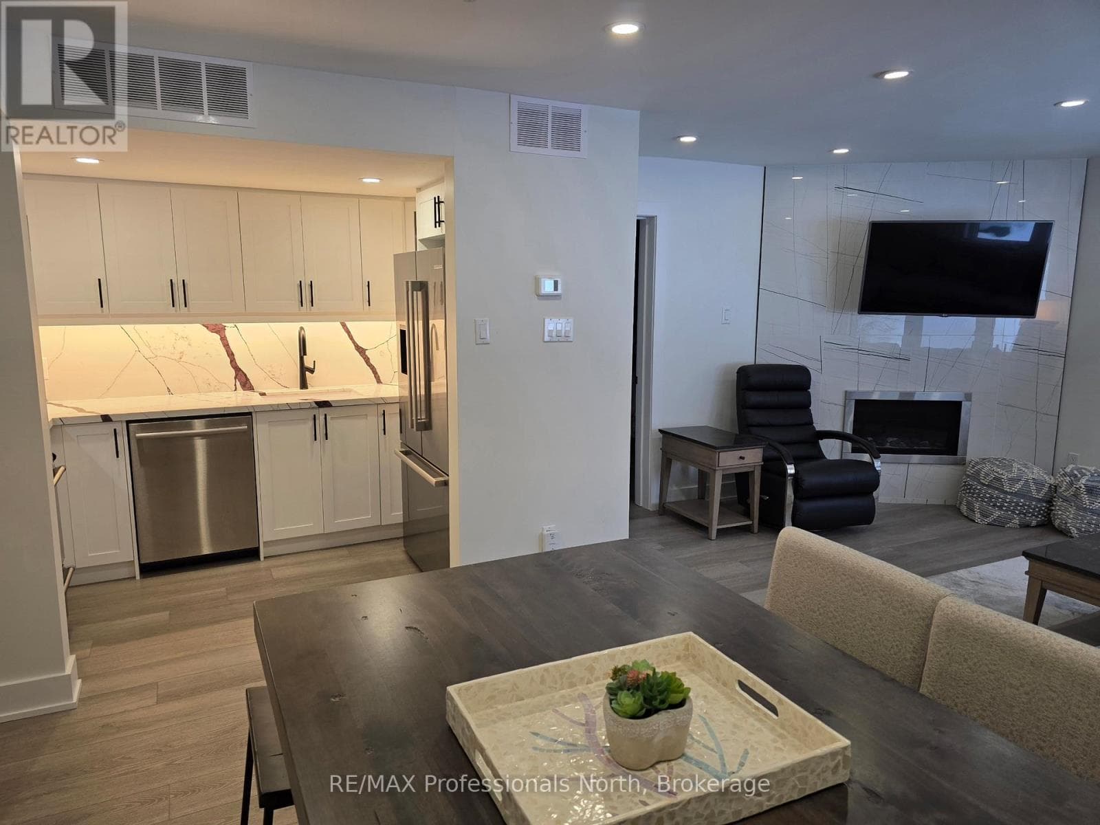 105 - 32 DEERHURST GREENS DRIVE, OnePoint — photo 3