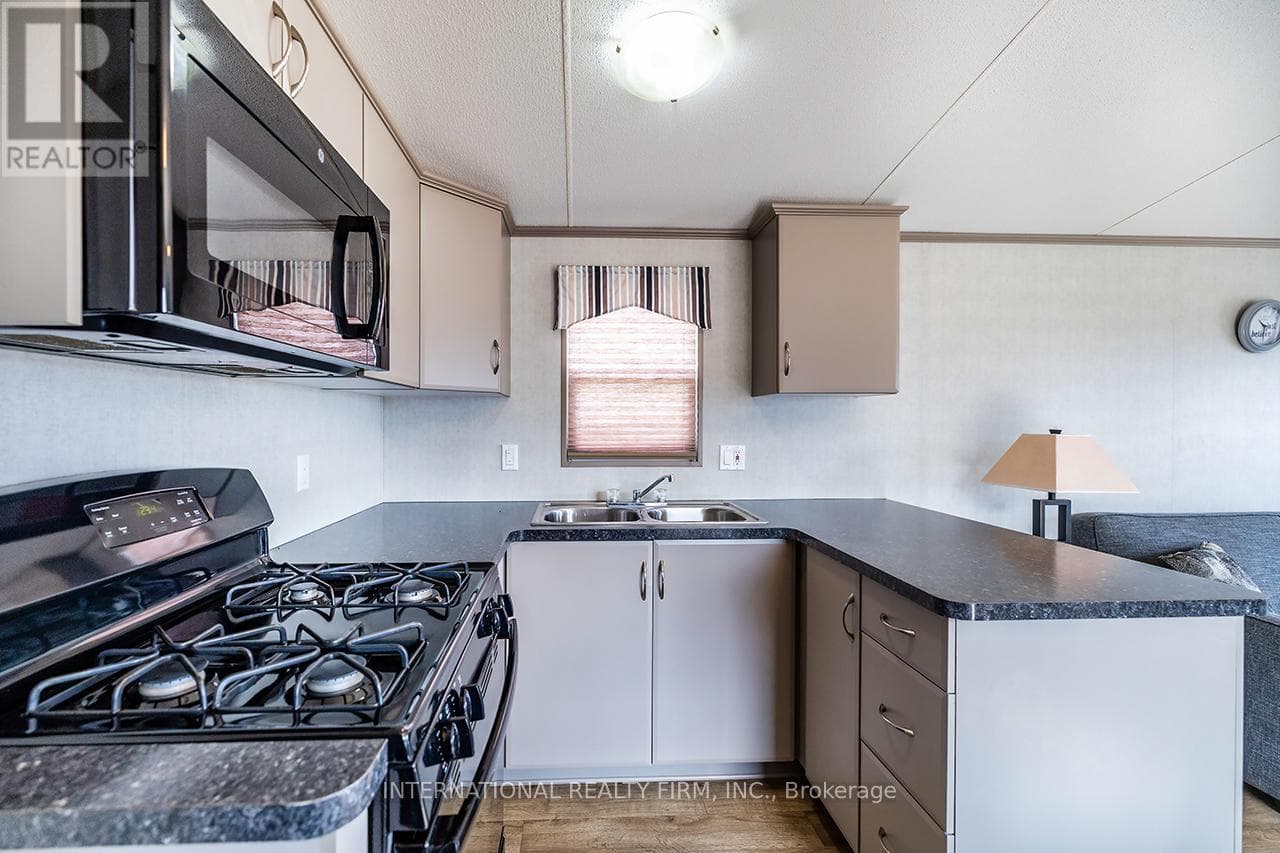 1235 VILLIERS LINE - 34 GLEN ABBEY, Toronto — photo 5