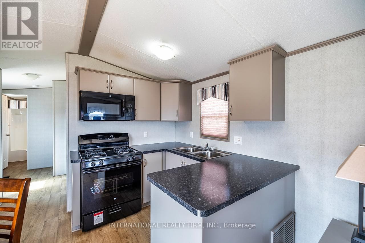1235 VILLIERS LINE - 34 GLEN ABBEY, Toronto