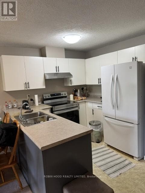 203 - 3160 WILDWOOD DRIVE, Toronto — photo 2