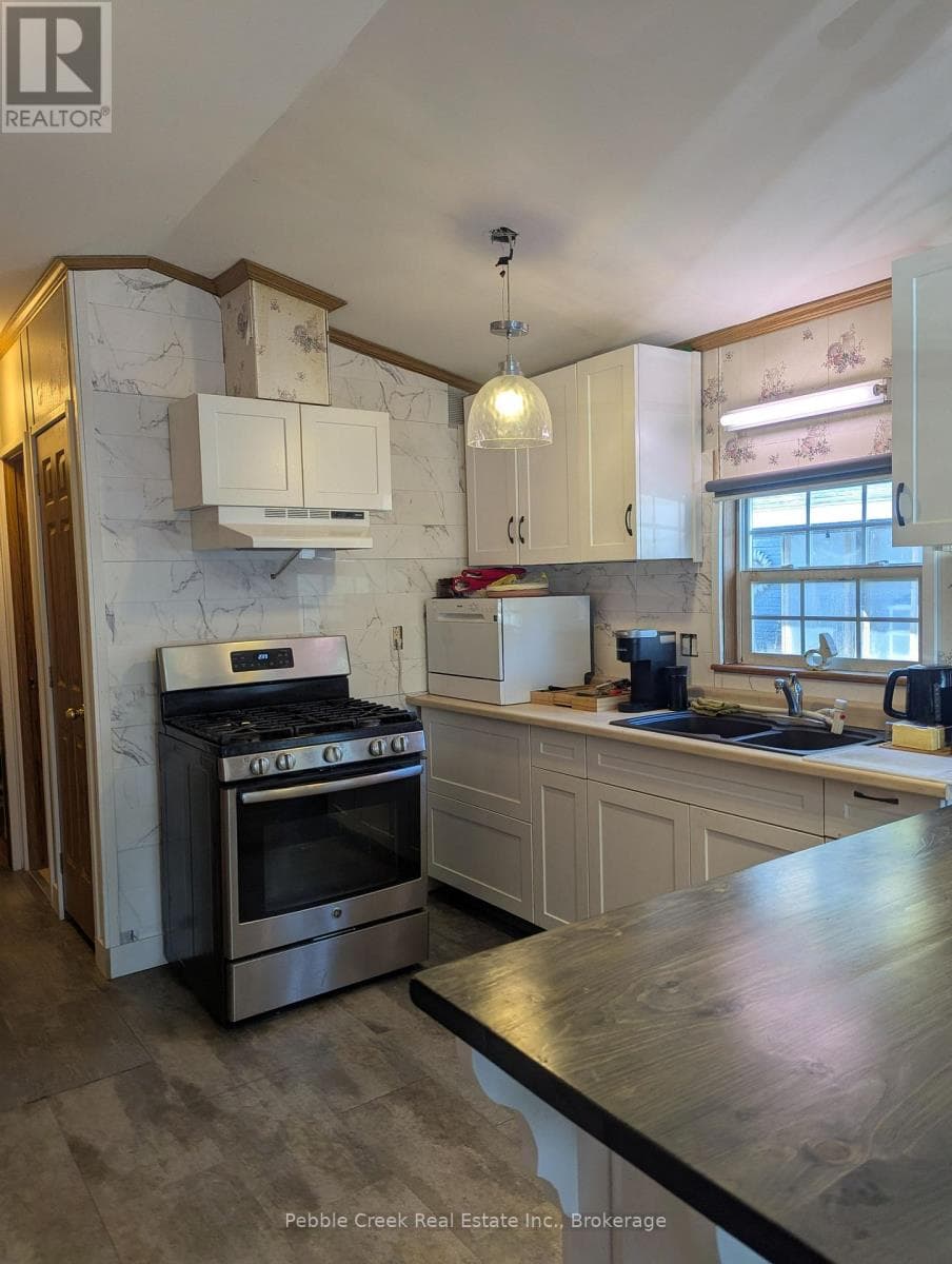 E8 HICKORY - 77794 ORCHARD LINE, OnePoint — photo 5