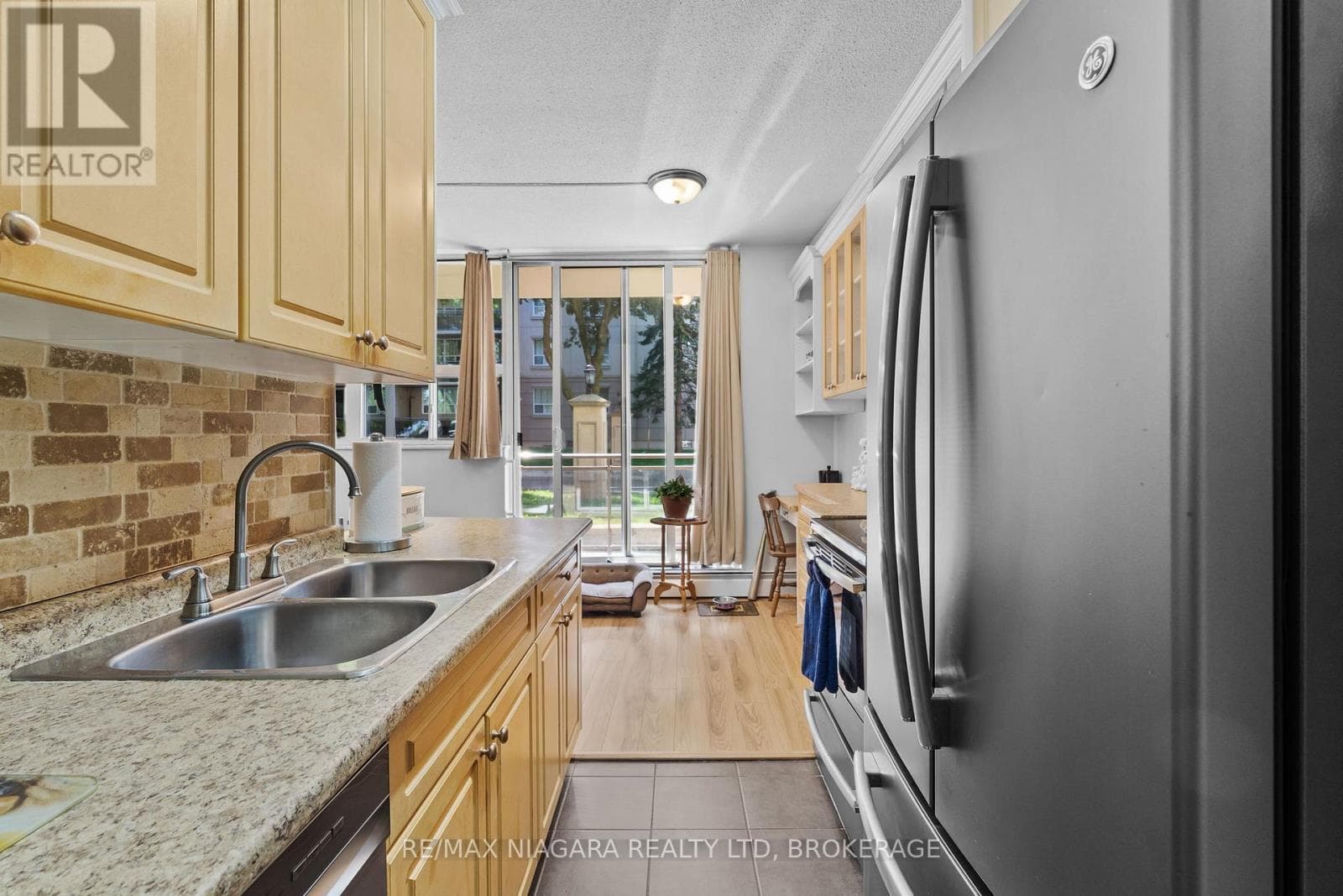 107 - 6390 HUGGINS STREET, Niagara — photo 4