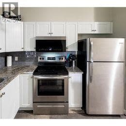1875 Country Club Drive Unit# 1110, Interior REALTORS® — photo 4