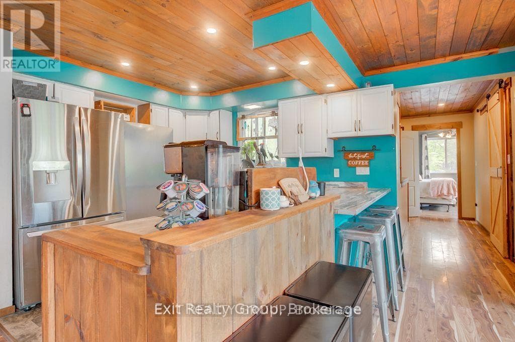 1058 WELLMAN ROAD, Central Lakes — photo 5