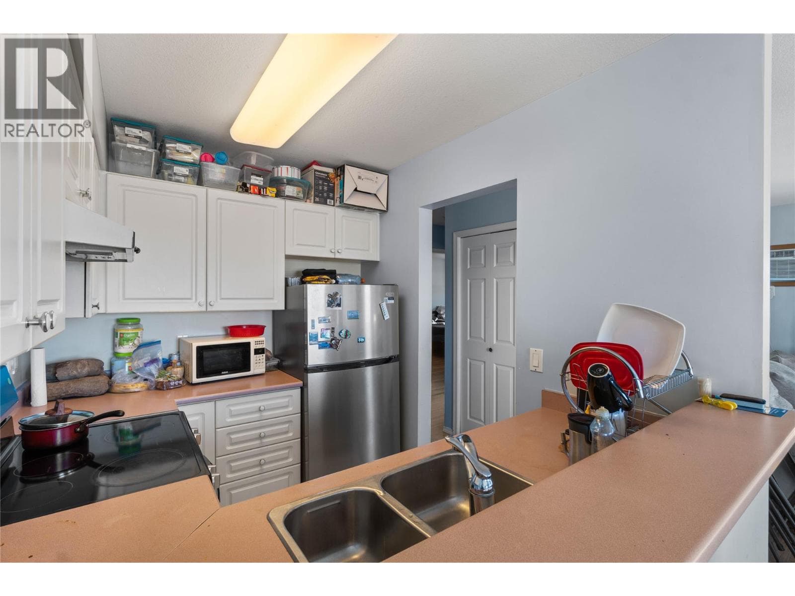 1160 HUGH ALLAN Drive Unit# 406, Interior REALTORS® — photo 5