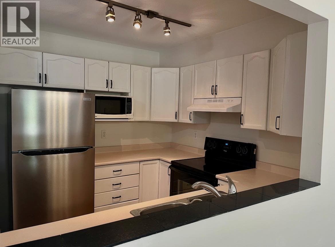 1607 43 Avenue Unit# 304 Lot# SL 10, Interior REALTORS® — photo 4