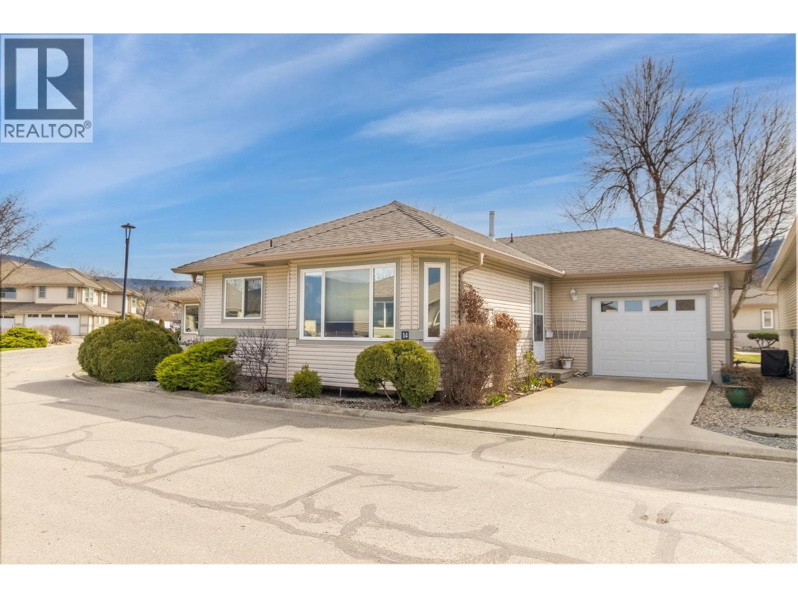 111 Harbourfront Drive NW Unit# 14 in