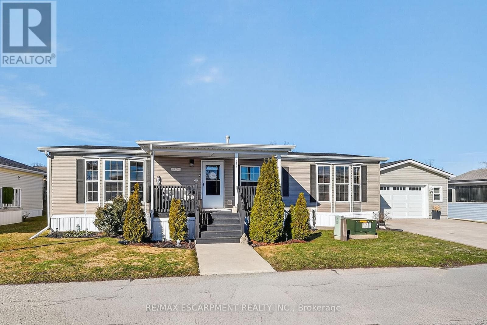 3033 TOWNLINE Road Unit# 211 in